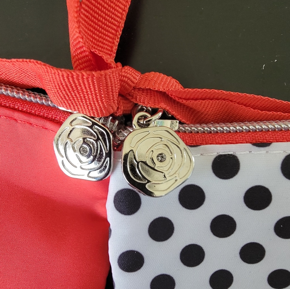 Two Lancome make up bags.